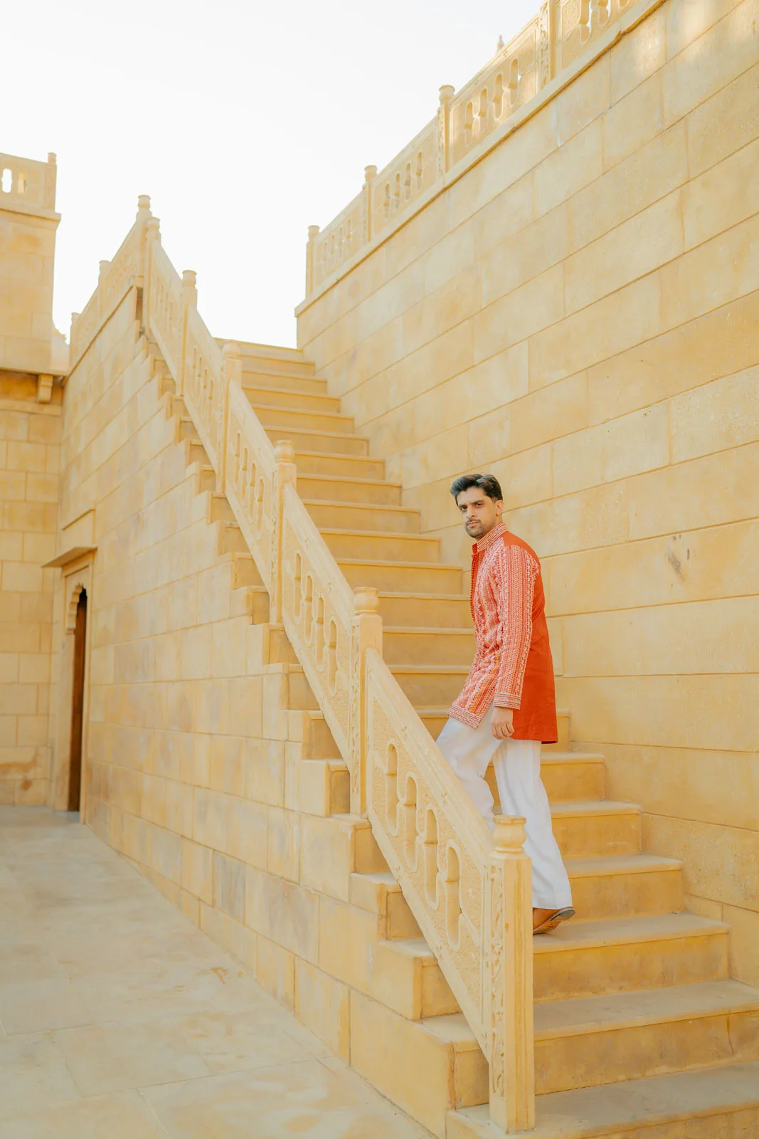 A Bride Against the Golden Palace Walls
