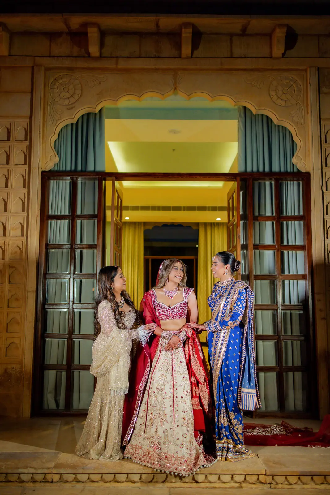 An Elegant Couple Framed by Rajasthani Arches