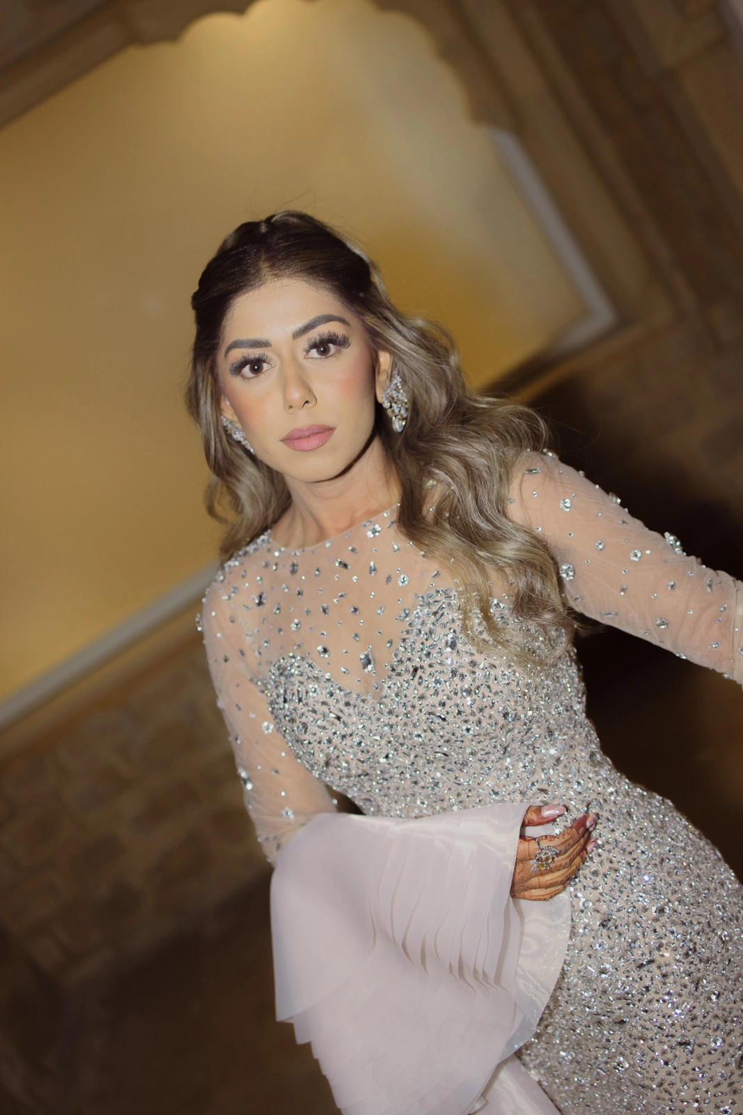 Bride Posing Elegantly in a Traditional Outfit