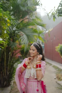 Bride Posing in Garden with Traditional Bridal Jewellery