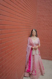 Bride Standing Against Artistic Terracotta Backdrop