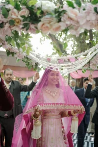 Bride Walking Through Beautiful Wedding Decor