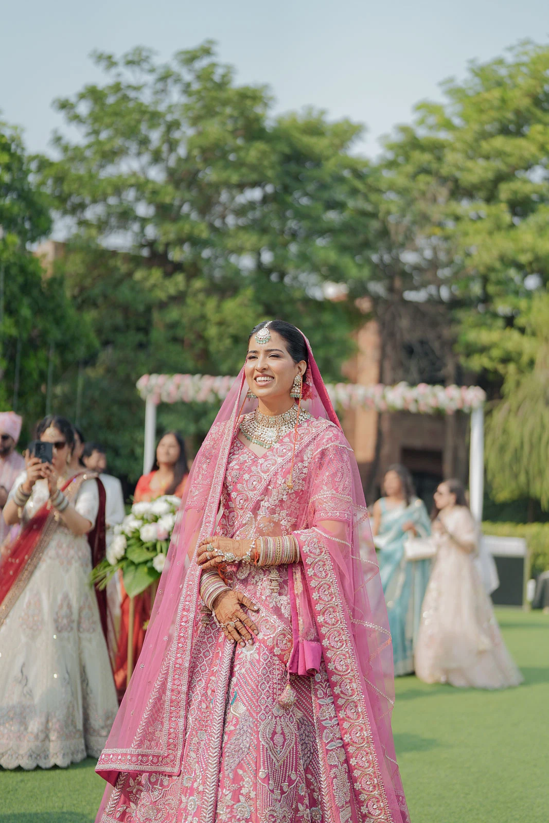 Bride Walking Through Garden