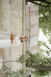 Bride Walking Through Heritage Wedding Venue