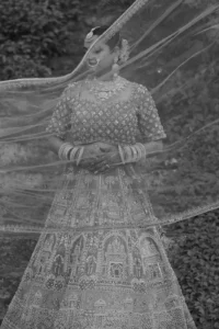 Bride Walking Through Outdoor Wedding Venue