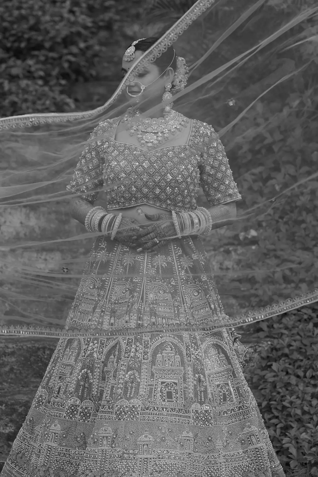 Bride Walking Through Outdoor Wedding Venue