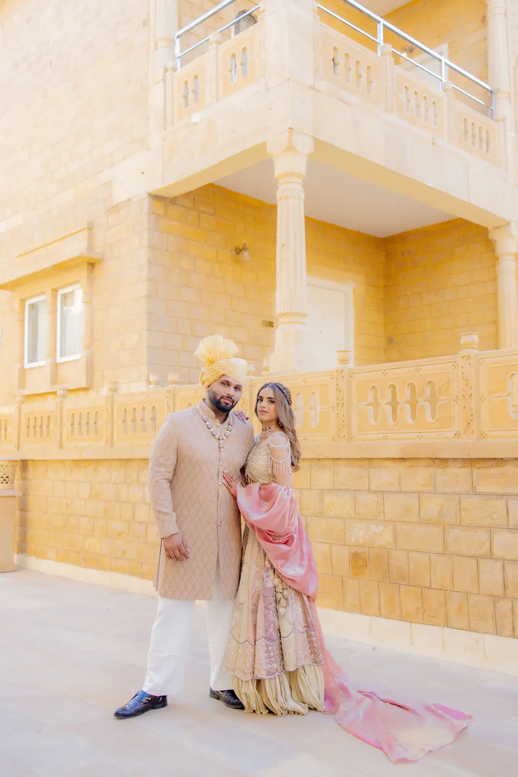 Bride Walking Through a Golden Courtyard