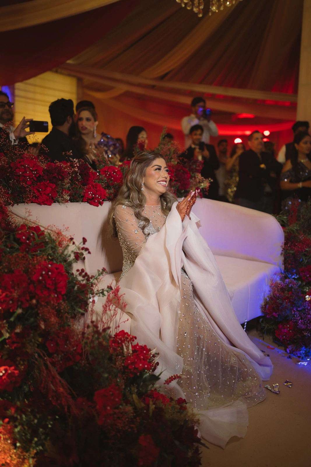 Bride and Groom During a Colorful Wedding Celebration