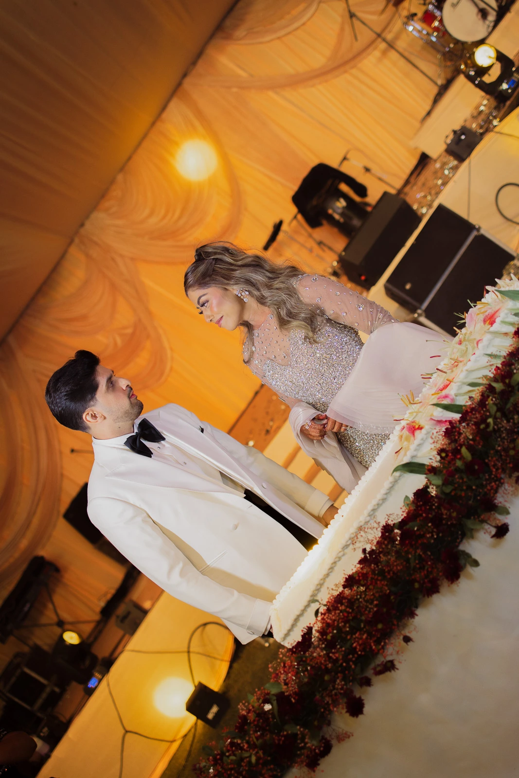 Bride and Groom During a Colorful Wedding Event