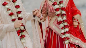 Bride and Groom Portrait Beneath Wedding Decor