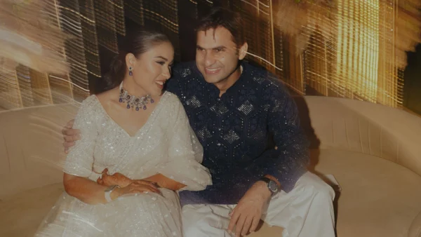 Bride and Groom Sitting Togethe