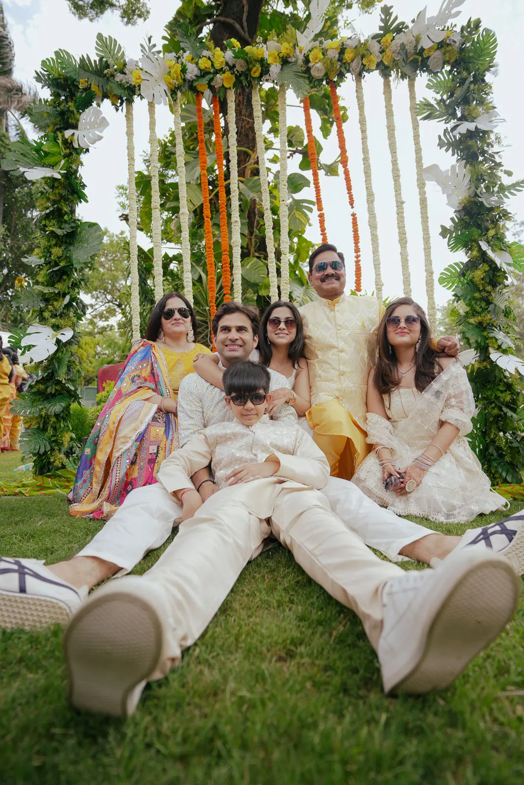 Bride and Groom Sitting Together in Garden