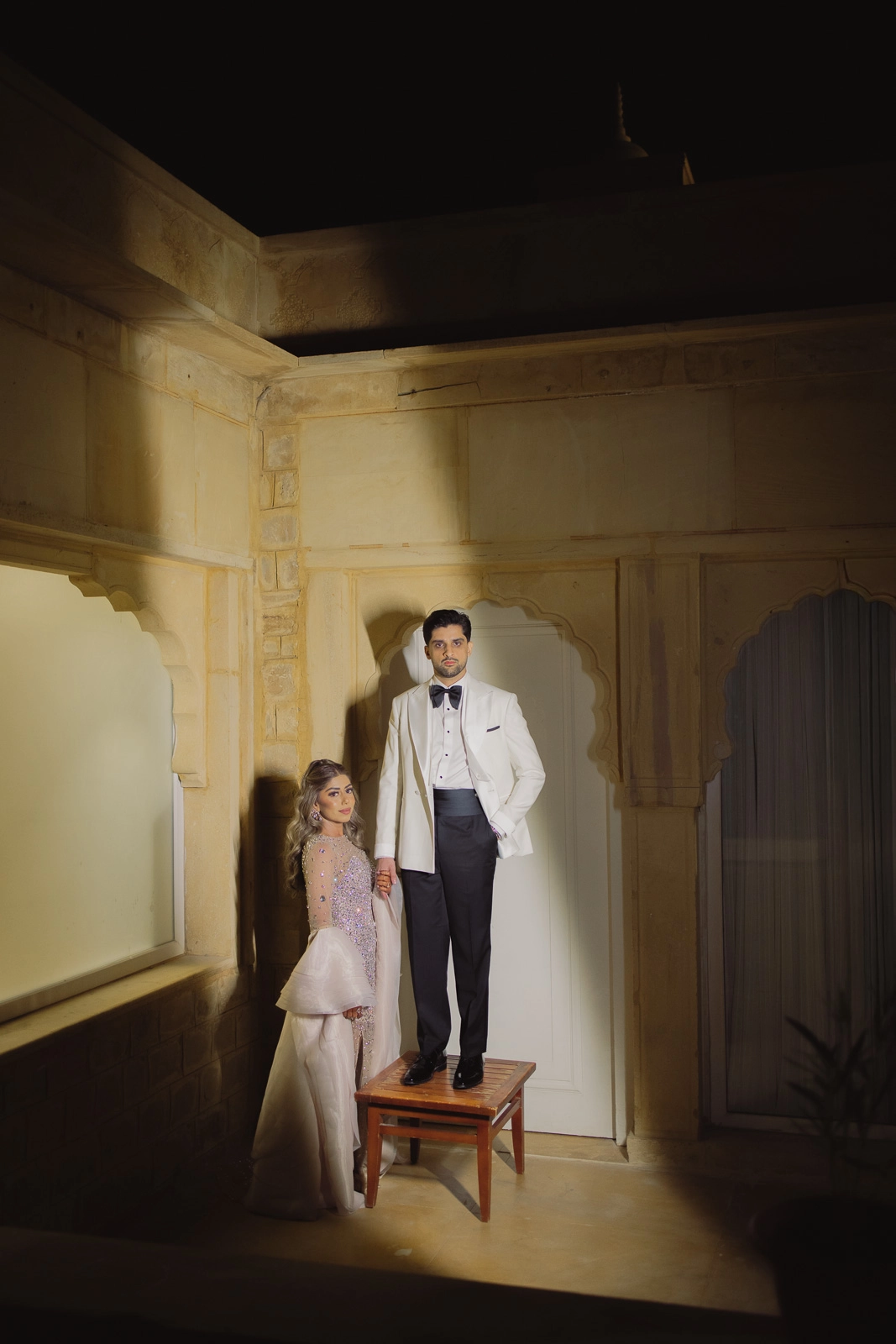 Bride and Groom Standing Together in a Heritage Interior