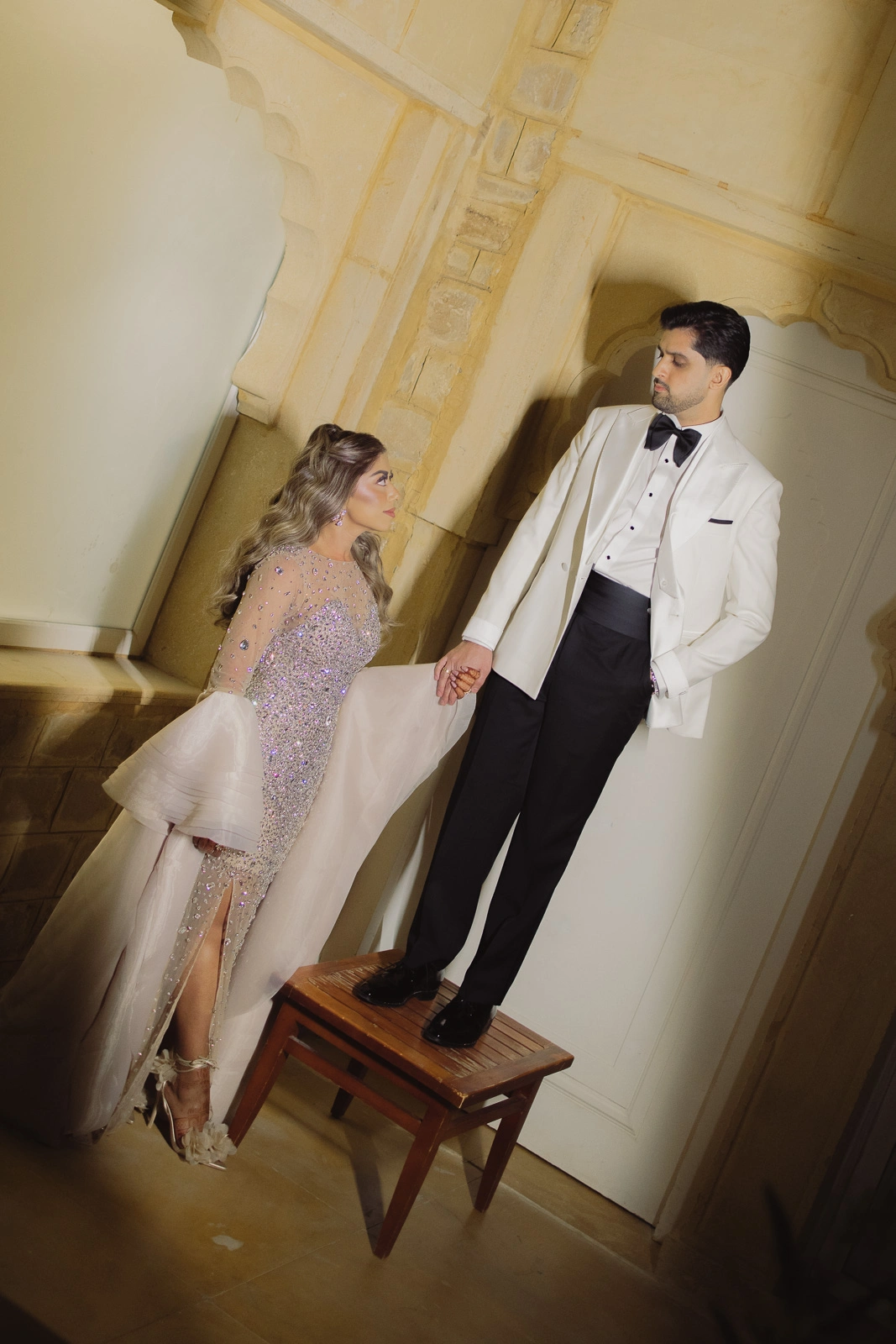 Bride and Groom Standing Together in a Heritage-Interior