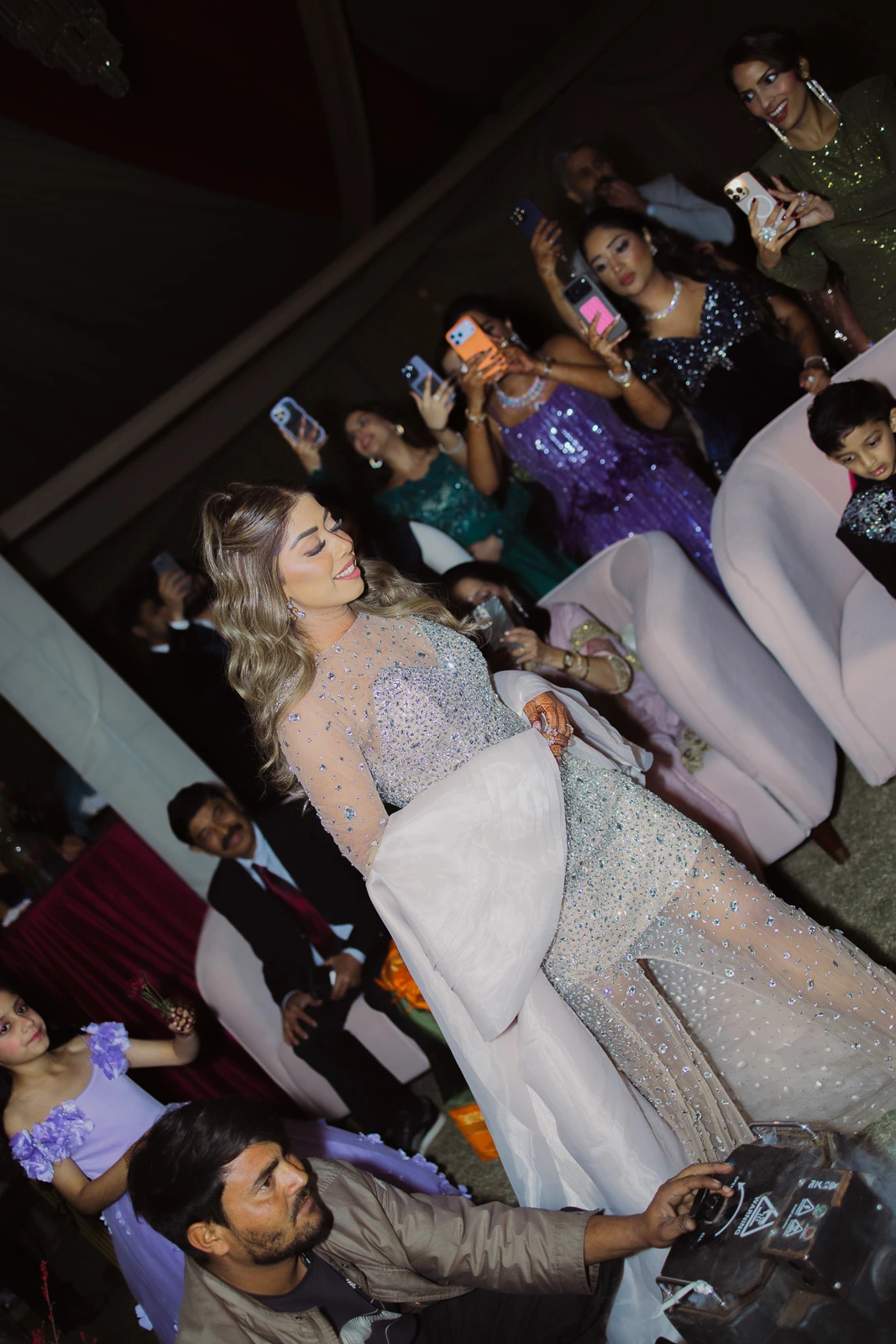 Bride and Groom Surrounded by Wedding Guests