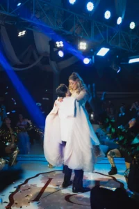 Bride and Groom Under Blue Event Lighting