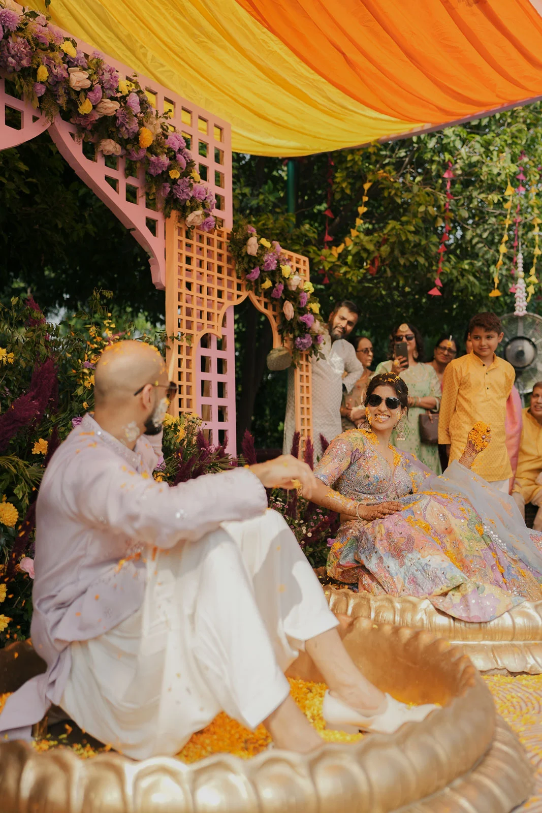 Bride and Groom Under Festive Wedding Decor