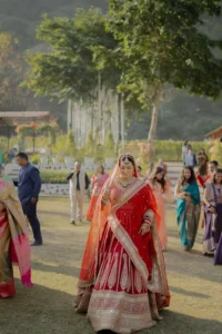 Bride and Groom Walking Through Garden Wedding Venue