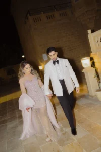 Bride and Groom Walking Through a Heritage Interior