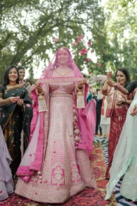 Bride and Wedding Party Under Floral Decor