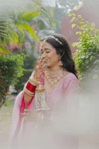Candid Bride Portrait in Traditional Pink Lehenga