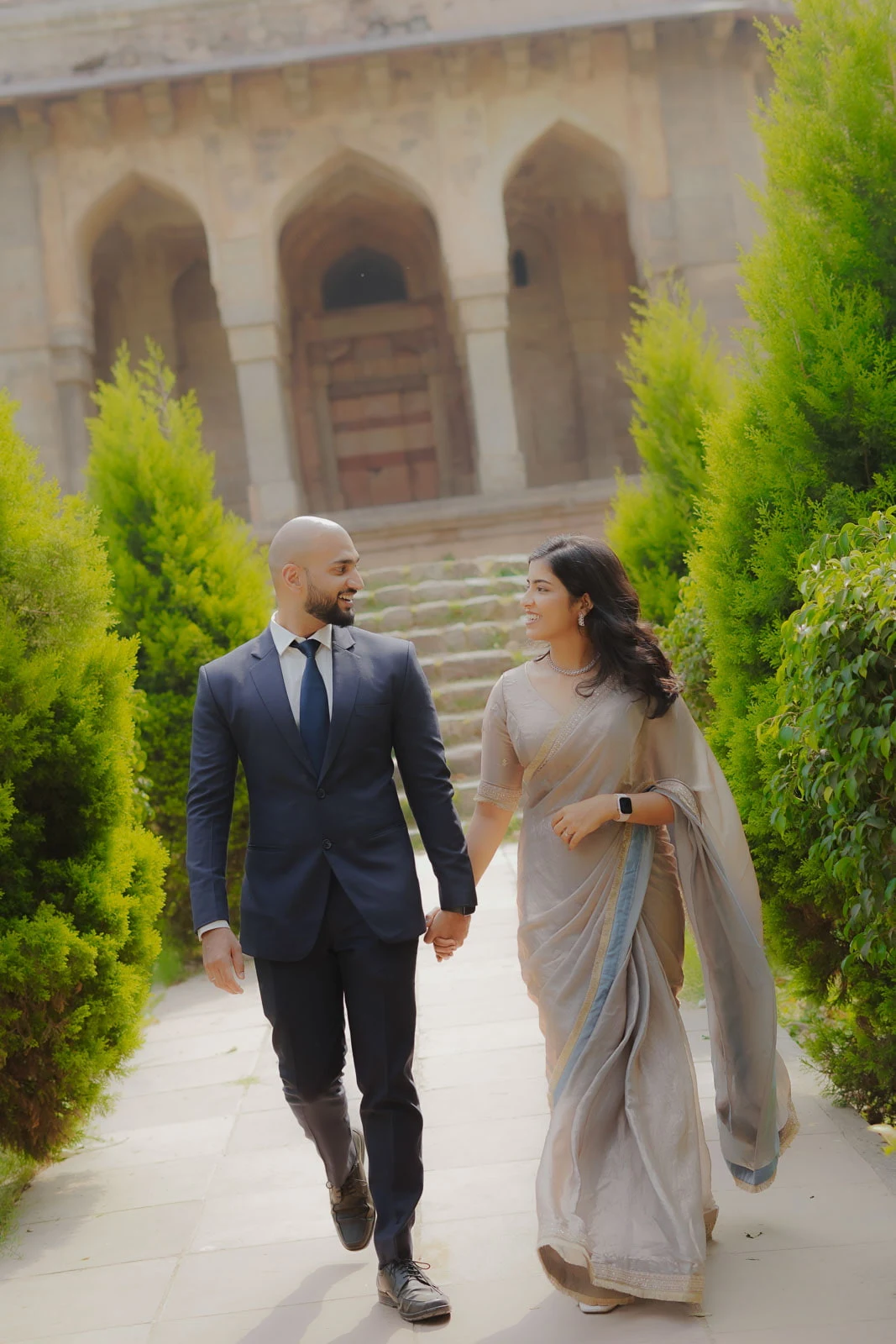 Candid Couple Walk Through a Delhi Garden