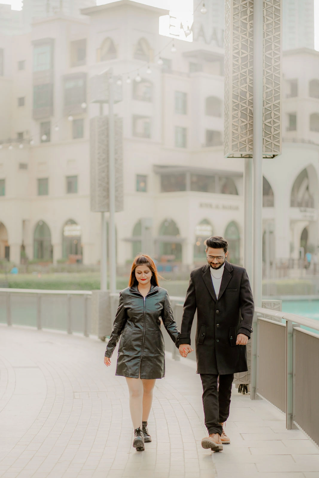 Candid Couple Walk in a Dubai Cityscape