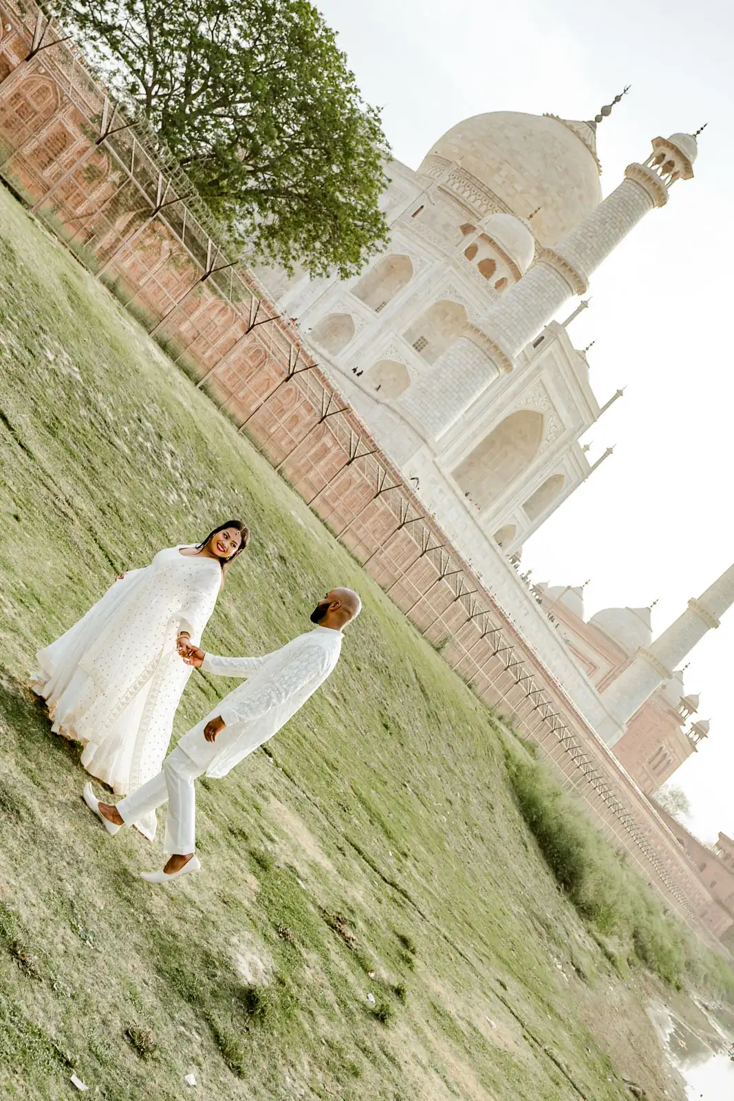 Candid Pre-Wedding Moment in Taj Mahal Gardens
