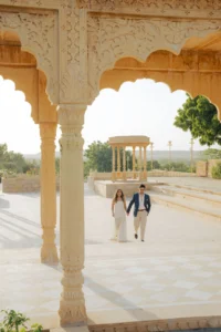 Classic Couple Walk Through a Jaisalmer Courtyard