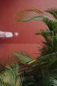 Couple Portrait Framed by Tropical Leaves