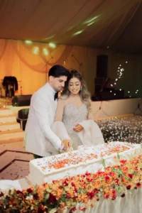 Couple Seated Together During the Evening Celebration