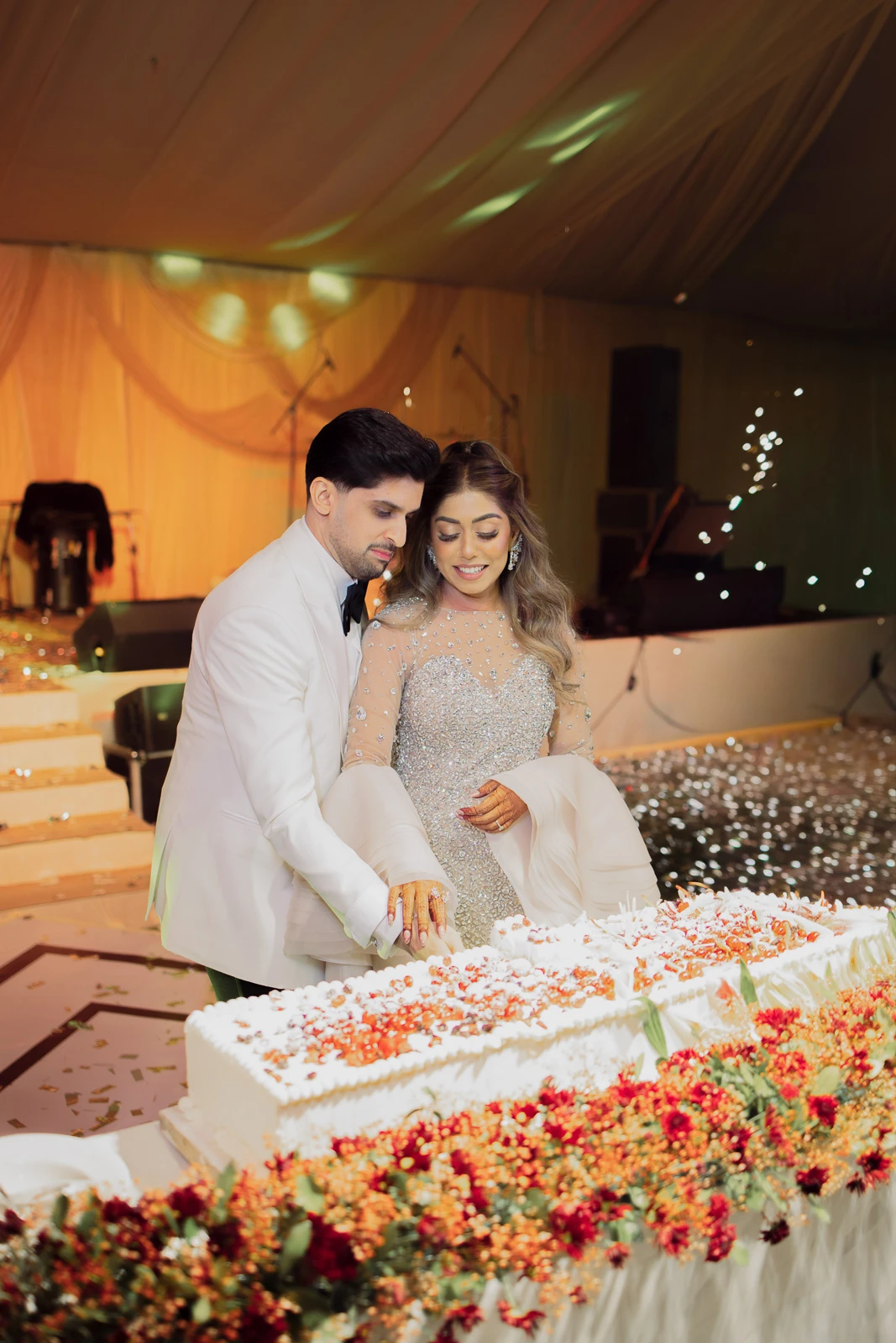 Couple Seated Together During the Evening Celebration
