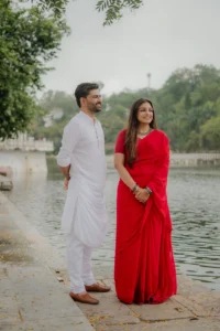 Couple Walking in Green Landscape – Udaipur Pre Wedding Photography
