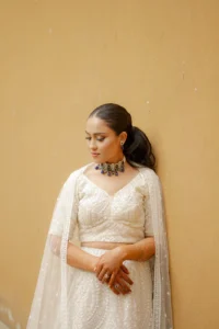 Elegant Bride Looking Away in Traditional Ivory Attire