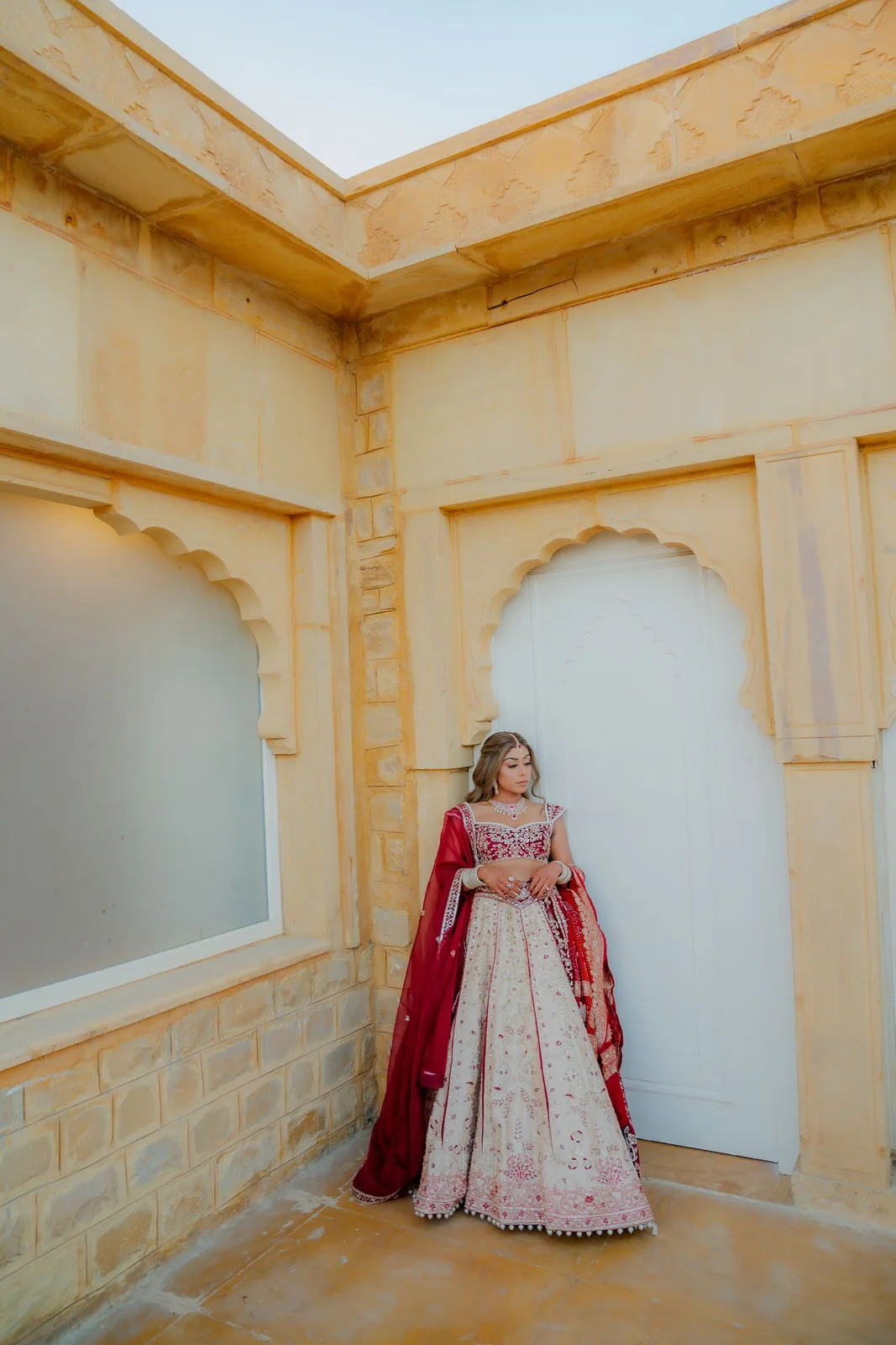 Elegant Bride Under a Golden Arch