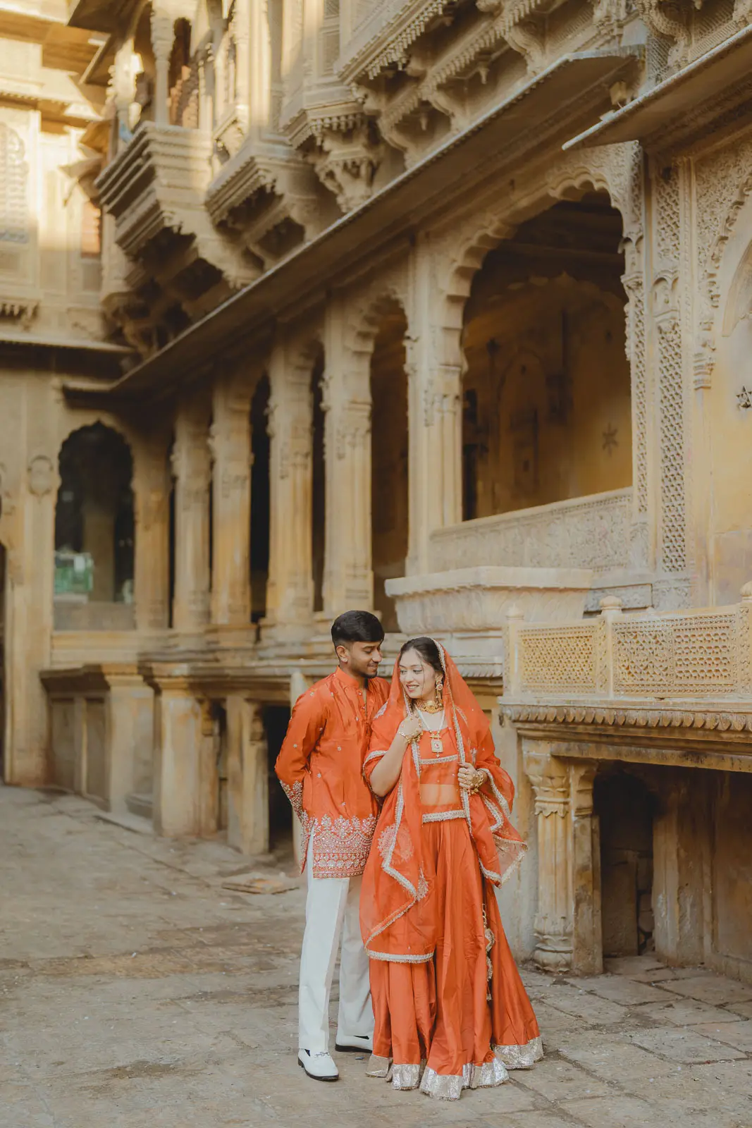 Elegant Red Dress Portrait in Jaisalmer Heritage