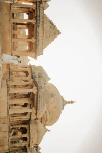Graceful Couple Pose Against Jaisalmer Walls