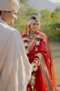 Groom Looking at Bride During Outdoor Wedding Portrait