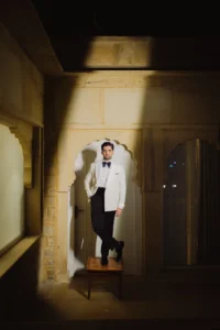 Groom Portrait in a Warmly Lit Room