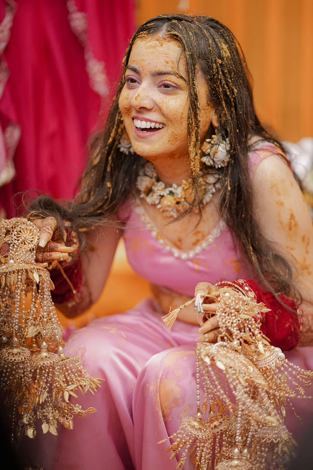 Joyful Bride Portrait in Pink Traditional Wedding Attire