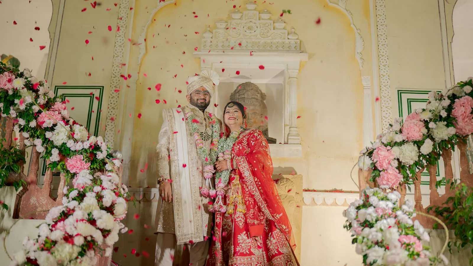 Romantic Bride & Groom Portrait Under Floral Decor