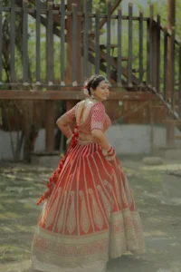 Traditional Bride Walking Through Garden Wedding Venue