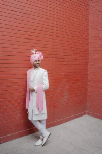 Traditional Groom Portrait in Pink Wedding Setting