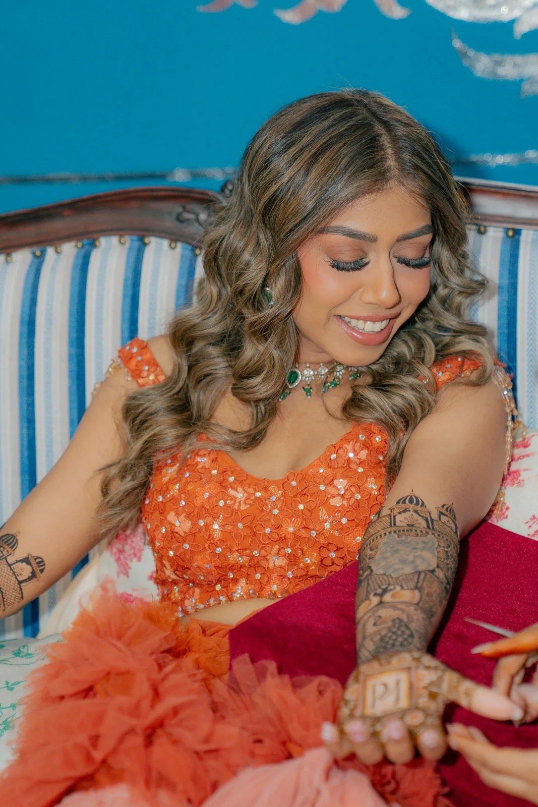 Vibrant Bridal Portrait Against Blue Heritage Walls