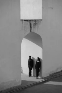 Black and white photo of couple in a domed structure