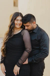 Close portrait of couple in black clothing outdoors
