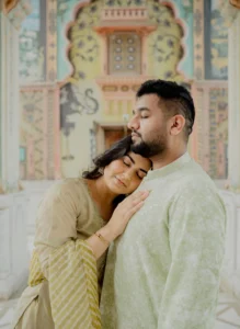 Close-up of couple embracing near a mosaic wall, Jaipur pre-wedding shoot