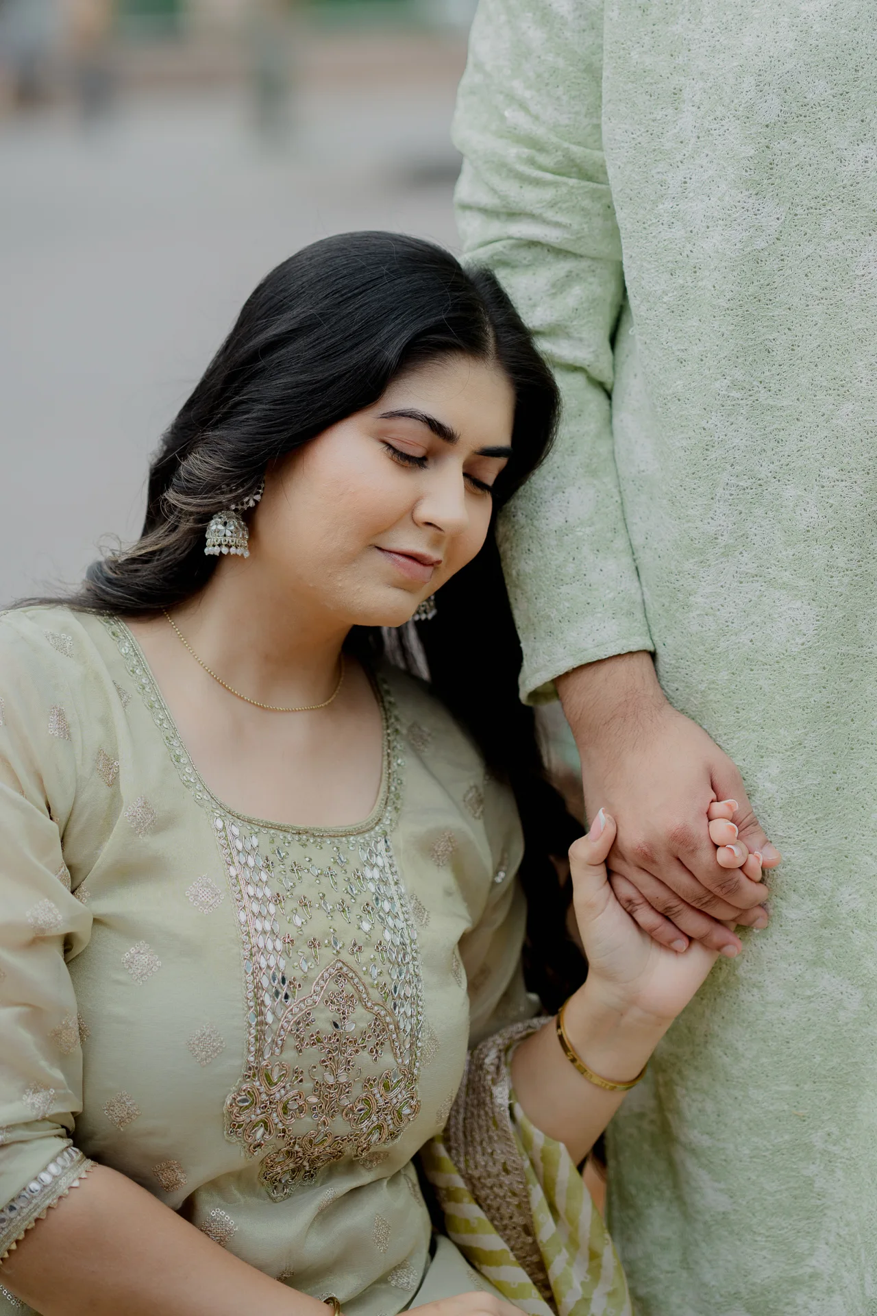 Close-up of woman holding man_s hand