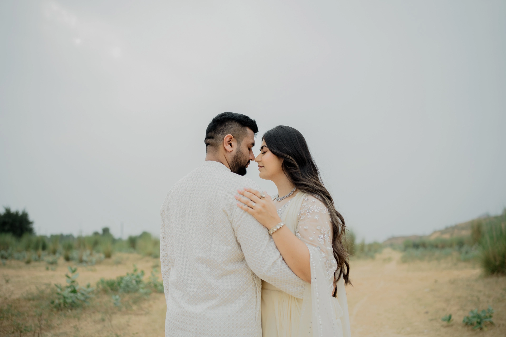Close-up portrait of couple embracing