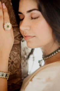 Close-up profile portrait of bride with jewelry, Amer Fort